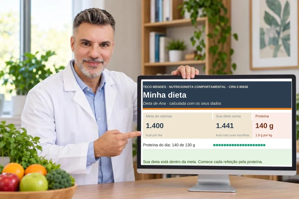 Teco Mendes no consultório mostrando a planilha Minha dieta no monitor